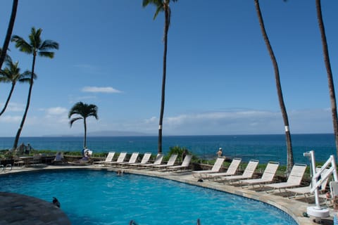 The heated pool has a beautiful  glass enclosure so you can enjoy the ocean view