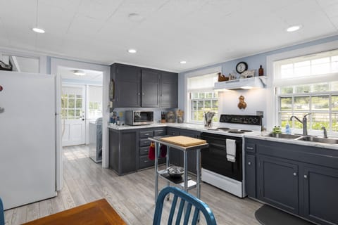 Kitchen leading to laundry and side door.