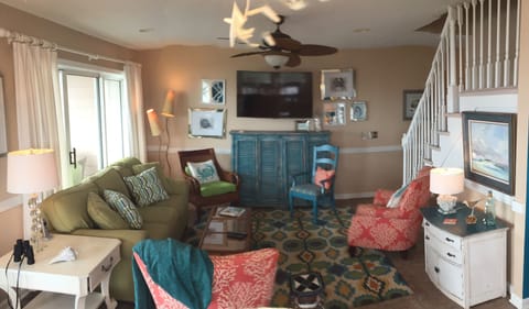 Living room with 55 in tv/ blue ray. Panoramic ocean views.