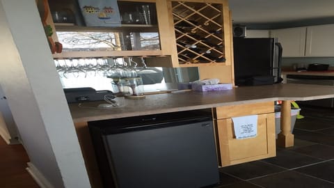 New Bar area well equipped with wine glasses