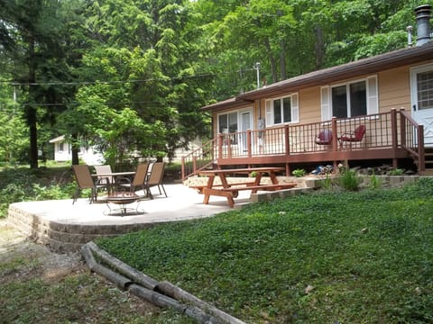 Front of cottage.  Gorgeous outdoor space for dining.  Firepit for evening fires