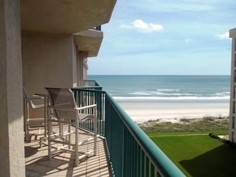 Balcony with Table and bar height chairs