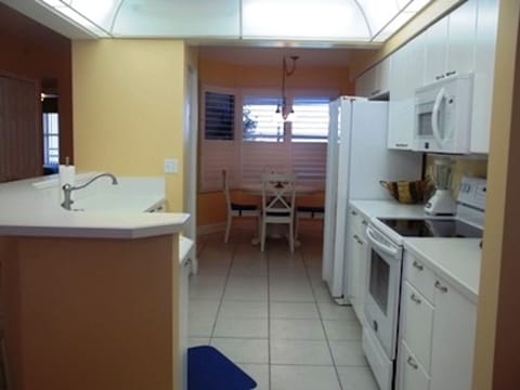 Kitchen looking into Breakfast Room