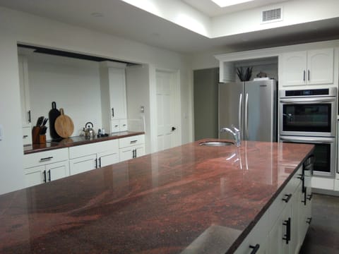 This side of the island is equipped with all the serving dishes and utensils.