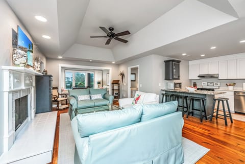 Open floor plan is bright and spacious, yet  cozy.