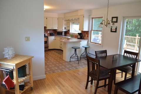Dining Rm + Breakfast Bar from Side Entry off Driveway