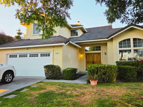 Brand new stucco siding - front view.
