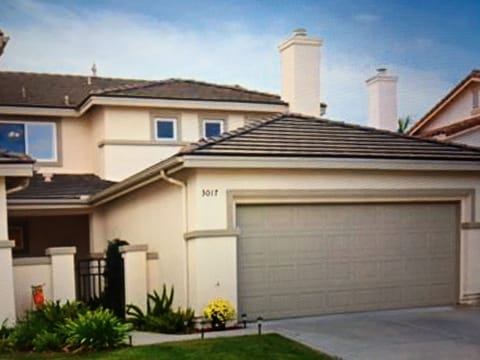 Welcome to our twin home. Entrance with private gate and sitting area.