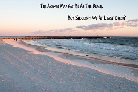 Beach and jetties in front of Summer Breeze.