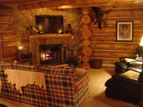 Family room with fireplace and flatscreen TV