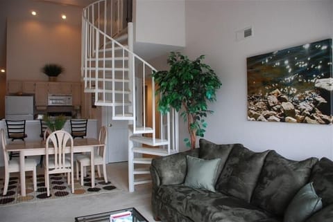 Main living area includes cath.ceiling, fireplace & 42' flat screen TV/DVD/VHS