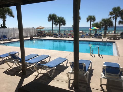 Sitting at the Club House Pool overlooking the Beach itself 