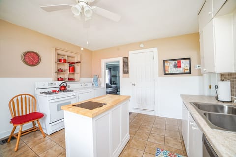 Kitchen and door to upstairs