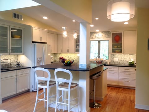 New contemporary kitchen with four stools.