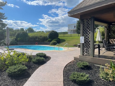 Your own private pool with lounge chairs and 2 patio tables and lots of chairs