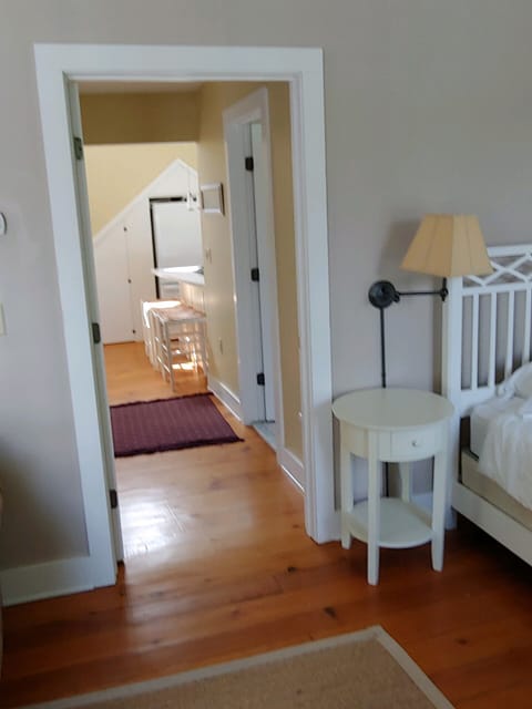 hallway to bath and kitchen