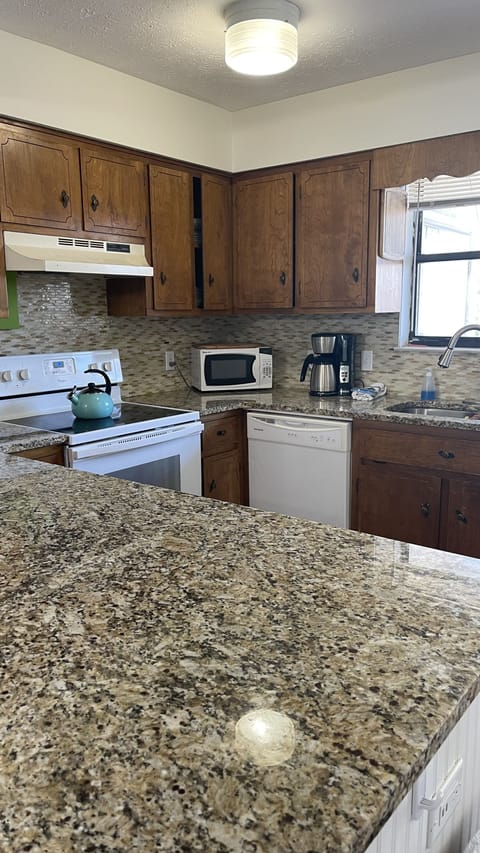 Full kitchen with all appliances too cook and enjoy your morning coffee