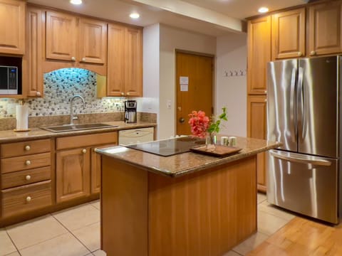 The open and spacious kitchen is great for entertaining and visiting.