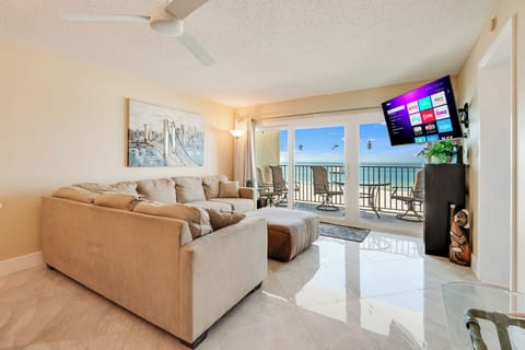 Living room with beach views and 55" smart tv