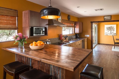 Kitchen + bar designed for large meal prep and entertaining.