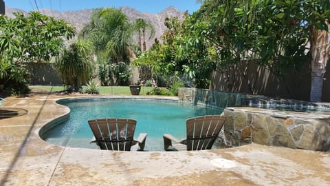 Sit in the salt water pool with a beverage or book