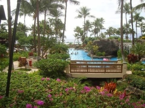 Lush landscaping, pristine pools invite you to slow down, savor each moment.