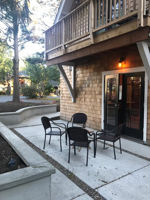 Patio outside main family room / kitchen, with sitting wall
