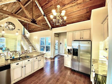Pecan Cottage kitchen with original 140 year old cedar ceiling