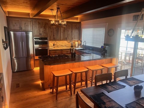 Brand new kitchen equiped with gas stove top, oven micro combo, large fridge,