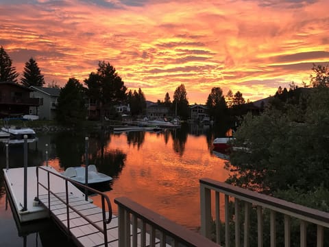 sunrise in back of house near personel boat dock