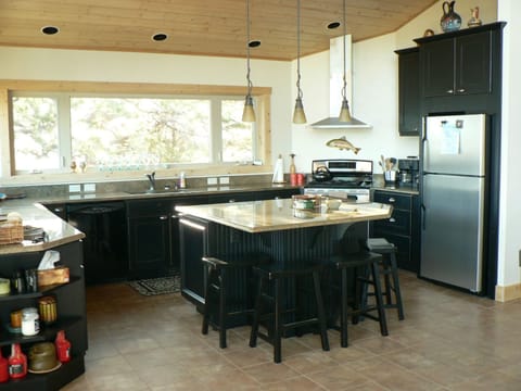 View of kitchen from the Great Room. More seating at the island.