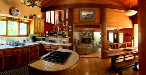 Kitchen with island and dining room table