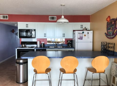 Kitchen and three chair bar