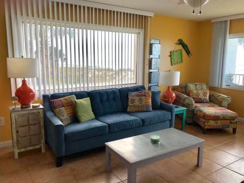 Living room. Foldout queen size bed. Views of beach from 2 huge picture windows.