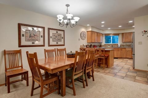 Unit seats 11 (8 at table + 3 at eating bar); flip top side table seats 4 more.