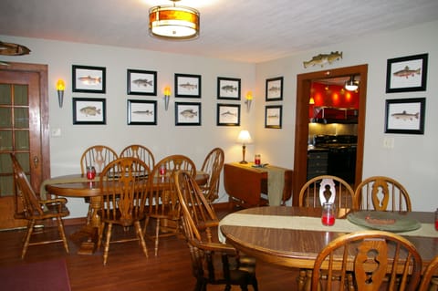 Room for 12 - 20 people in the Dining Room, with adjacent covered porch.