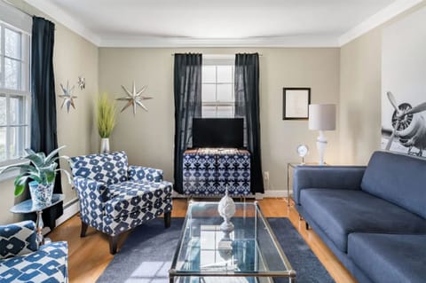 The living room has a flat screen Smart TV with streaming capacities.