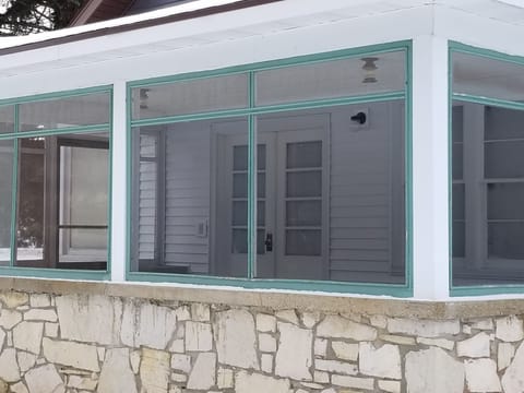 A very roomy screened porch allows for fun gatherings.
