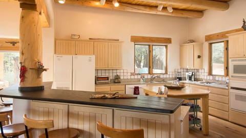 The dining table, slate bar and breakfast nook will seat up to 22 people