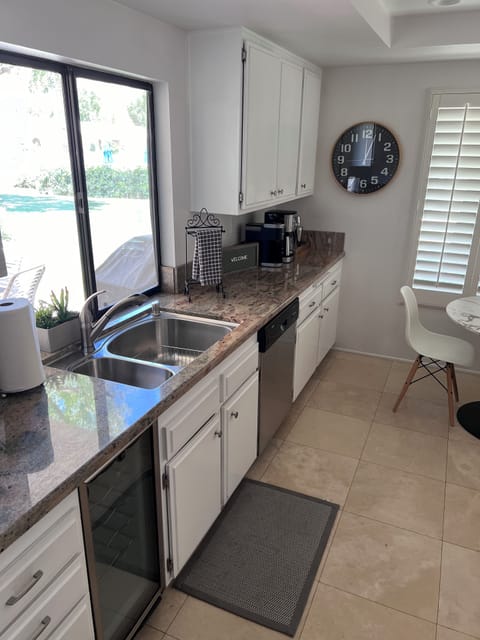 Fully stocked kitchen with patio views