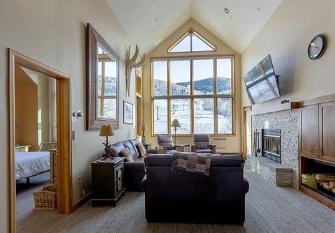 Great room with queen sleeper sofa.  Overlooks slope.