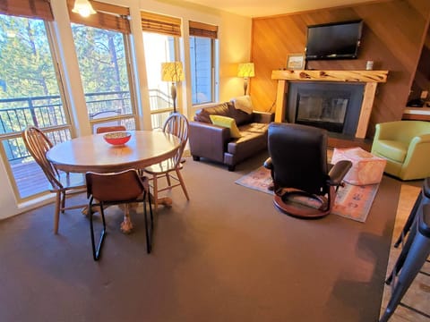 Table for dinner, games, morning paper. Fireplace, TV with Roku. Southern view.