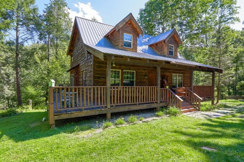 Wrap around balcony offers treetop view of brook, flora, and fauna. 