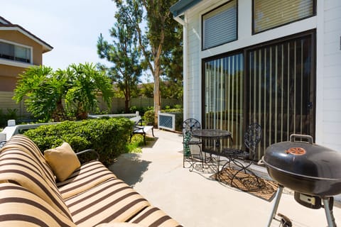 private downstairs patio, sunny and comfortable! Great for grilling, chilling