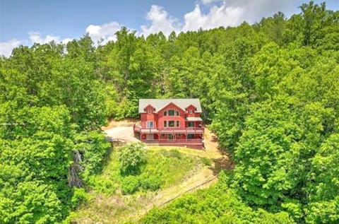 Shows elevation of house on side of mountain.