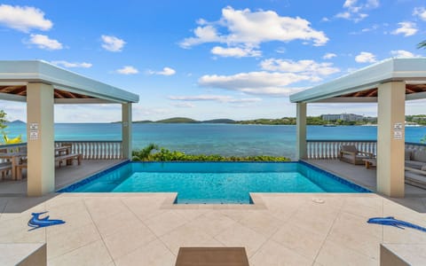 Oceanfront infinity pool just steps from your private beach