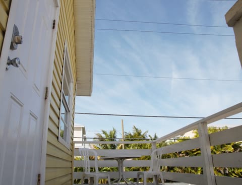 Outside front door enjoy some relaxing time on the upstairs private porch.
