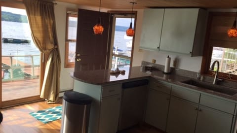 Side door to dock and sliding glass door to the deck.  Both great for fishing. 