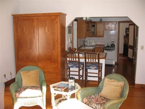 Full kitchen, new Armoire Queen bed w/ view to doorway of master bedroom