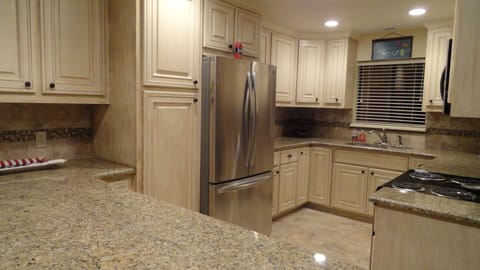 Remodeled kitchen-appliances, granite counters, new cabinets/tile